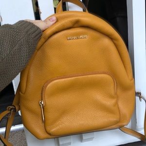 Michael Kors yellow backpack
